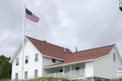 Roof Before Showing Many Replaced Shingles