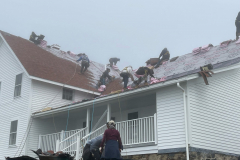 Crew Installing Shingles